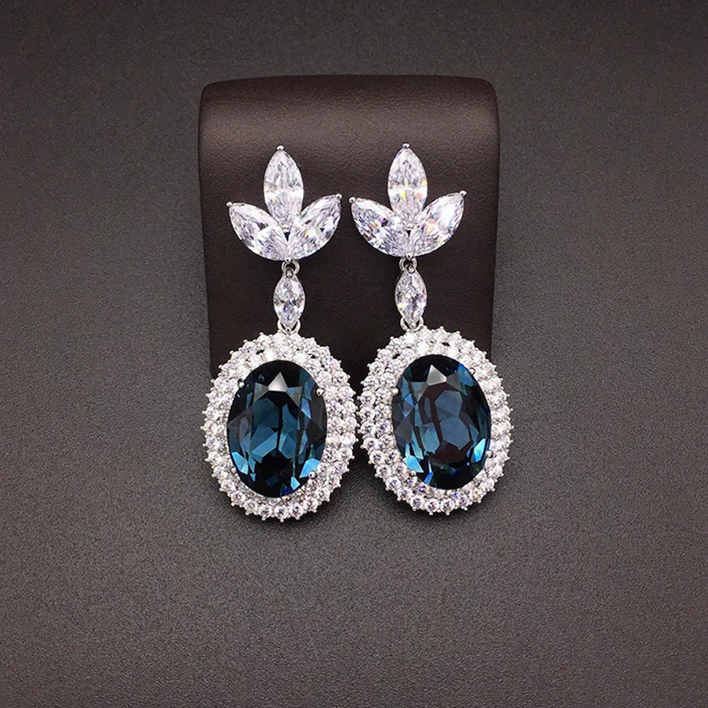 Boucles d'oreilles pendantes de luxe en cristal ovale bleu saphir pour femme