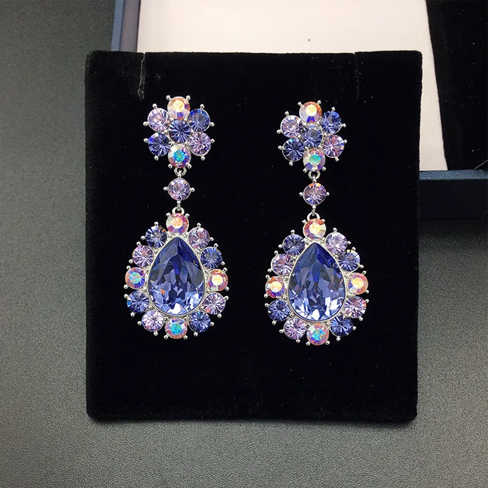 Boucles d'oreilles de luxe en cristal bleu en forme de goutte avec halo multicolore
