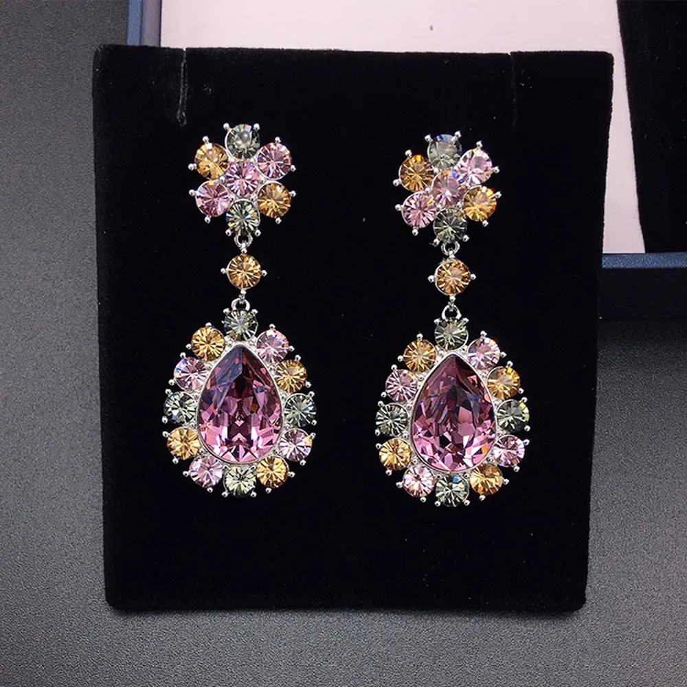 Boucles d'oreilles de luxe en cristal bleu en forme de goutte avec halo multicolore