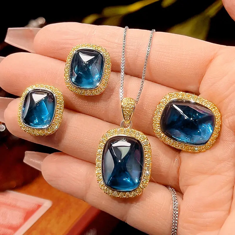 Parure de bijoux vintage avec collier, boucles d'oreilles et bague en zircon bleu