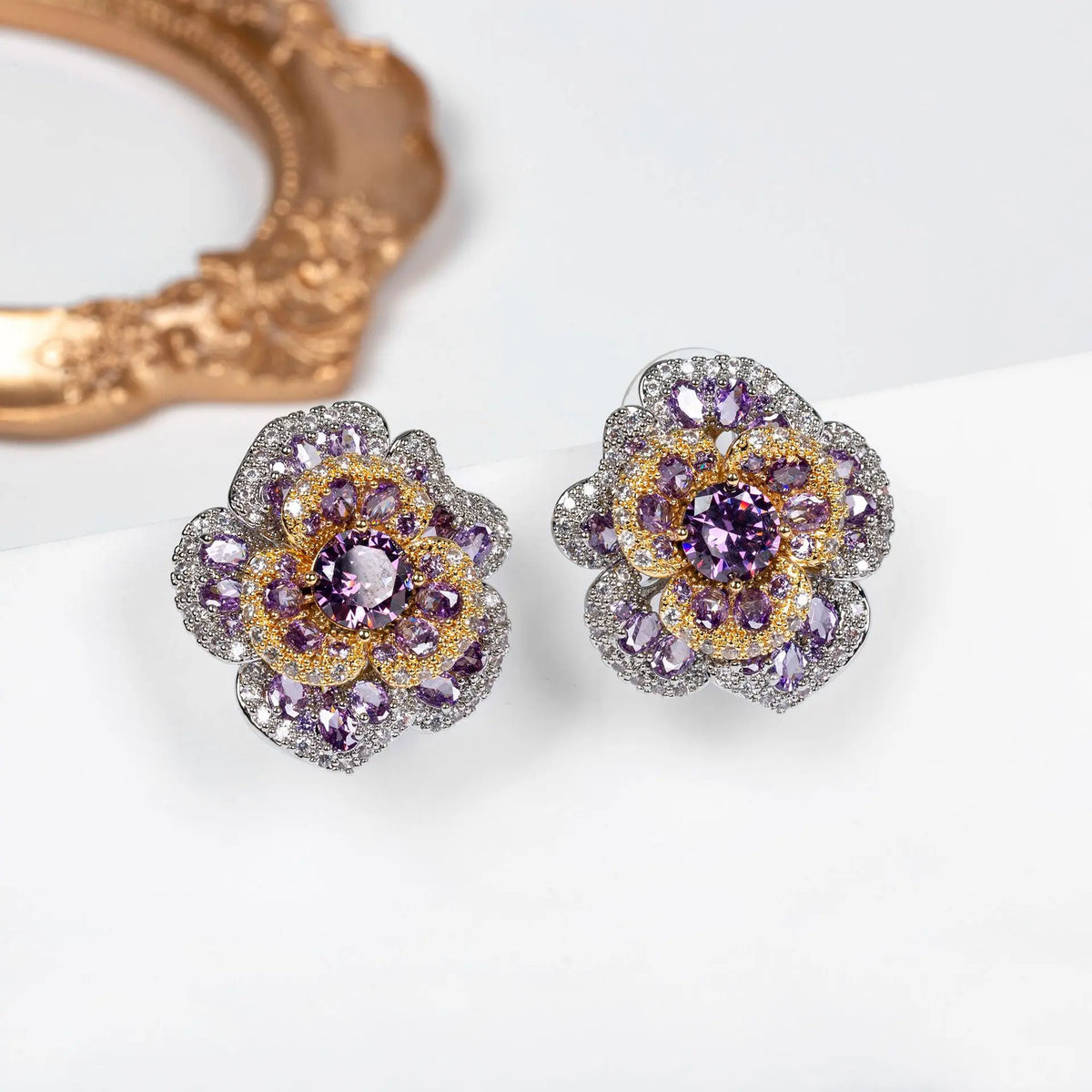 Boucles d'oreilles clous fleur en cristal rouge orangé de luxe