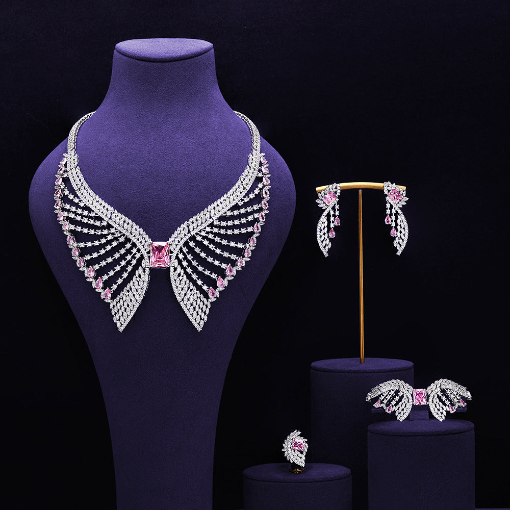 Parure de bijoux de mariée vert émeraude – Design de luxe inspiré des ailes