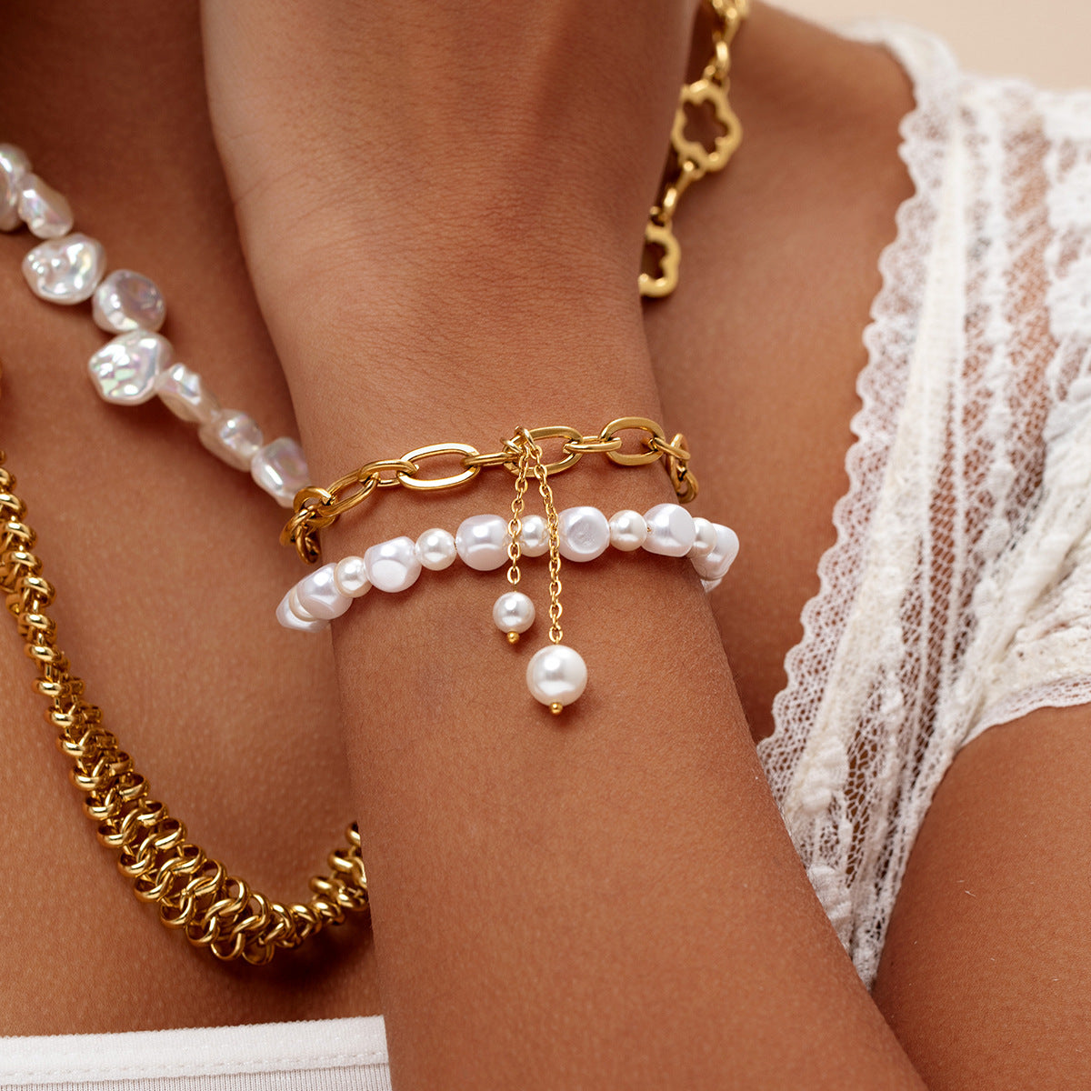 Fashion stitching pearl titanium steel bracelet