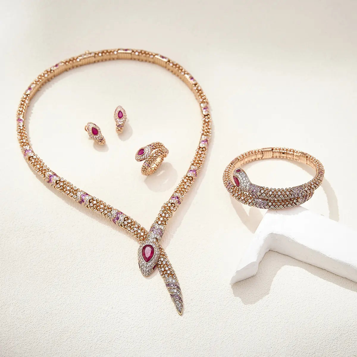 Designer Rose Gold Snake Chain Jewelry Set with Ruby Drop Stones