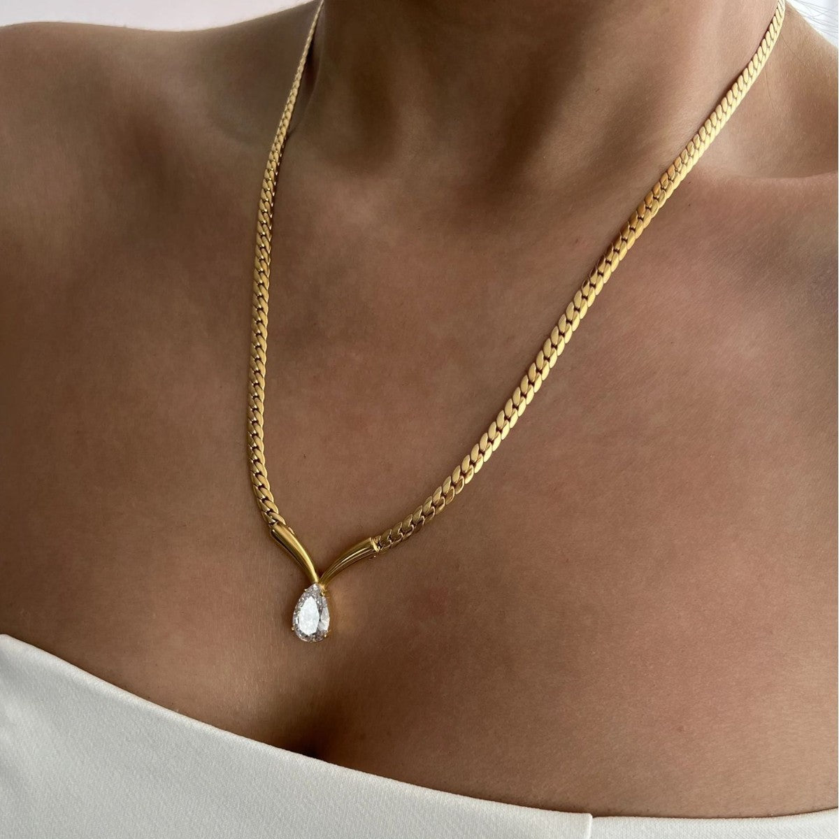 Water drop zircon snake bone necklace