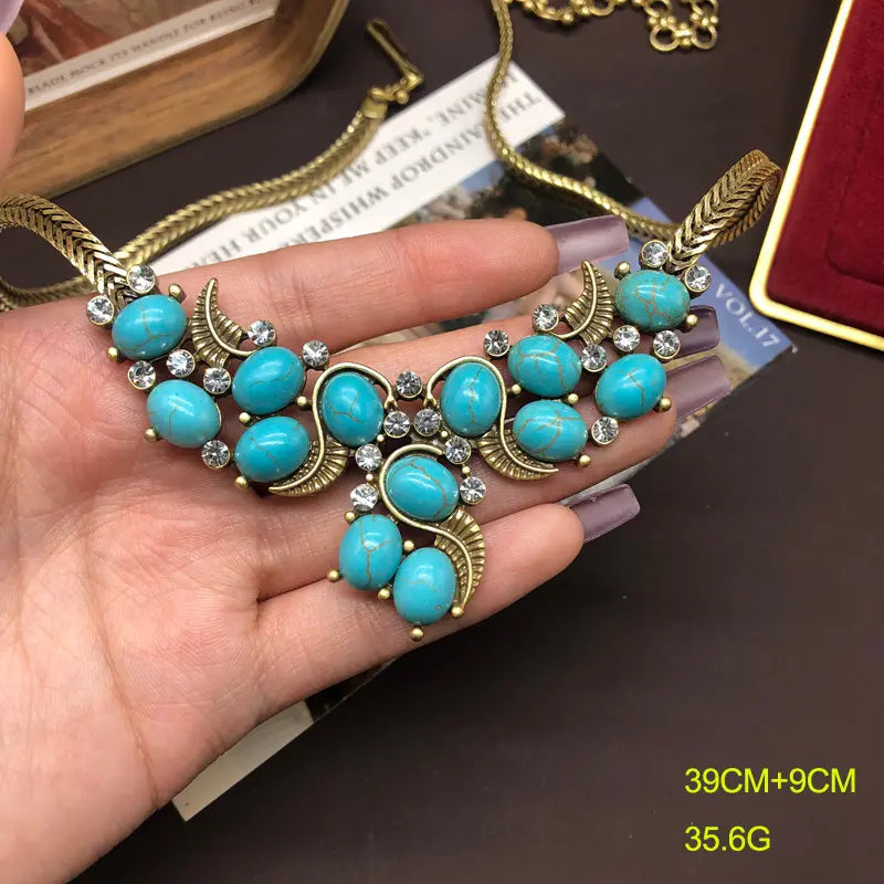 Ensemble collier et boucles d'oreilles turquoise au design vintage