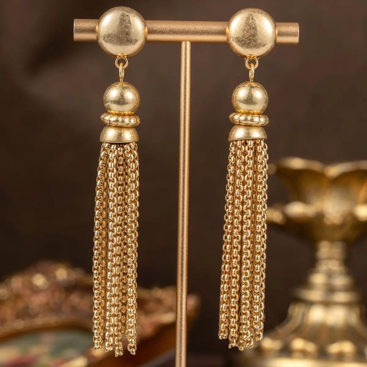 Parure collier et boucles d'oreilles femme pompon or de luxe