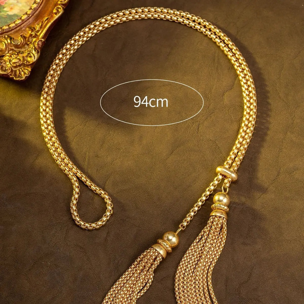 Parure collier et boucles d'oreilles femme pompon or de luxe