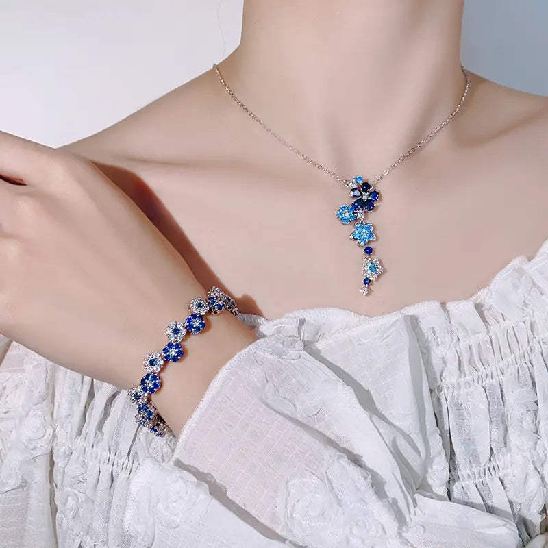 Parure de bijoux en forme de fleur de zircon bleu à la mode, collier, boucles d'oreilles et bracelet