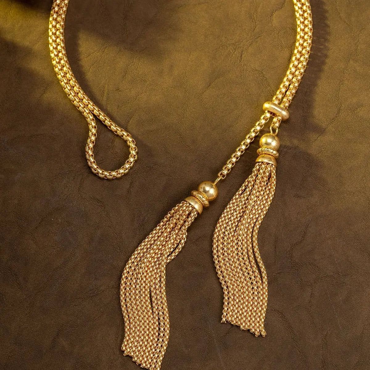 Parure collier et boucles d'oreilles femme pompon or de luxe