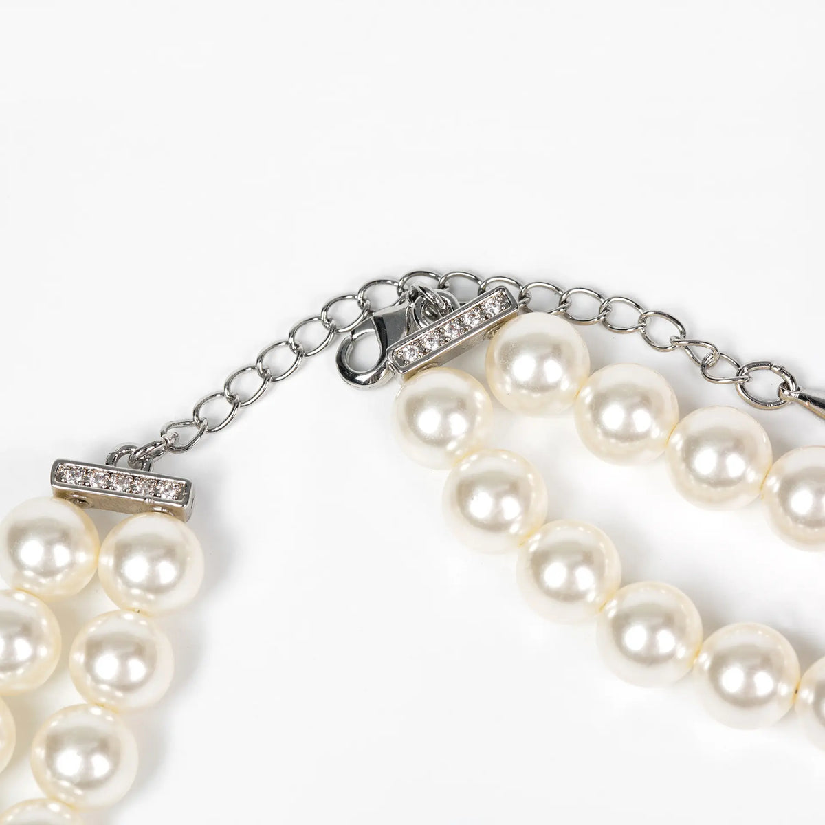 Ensemble collier et boucles d'oreilles nœud papillon en perles et diamants, style léger et luxueux