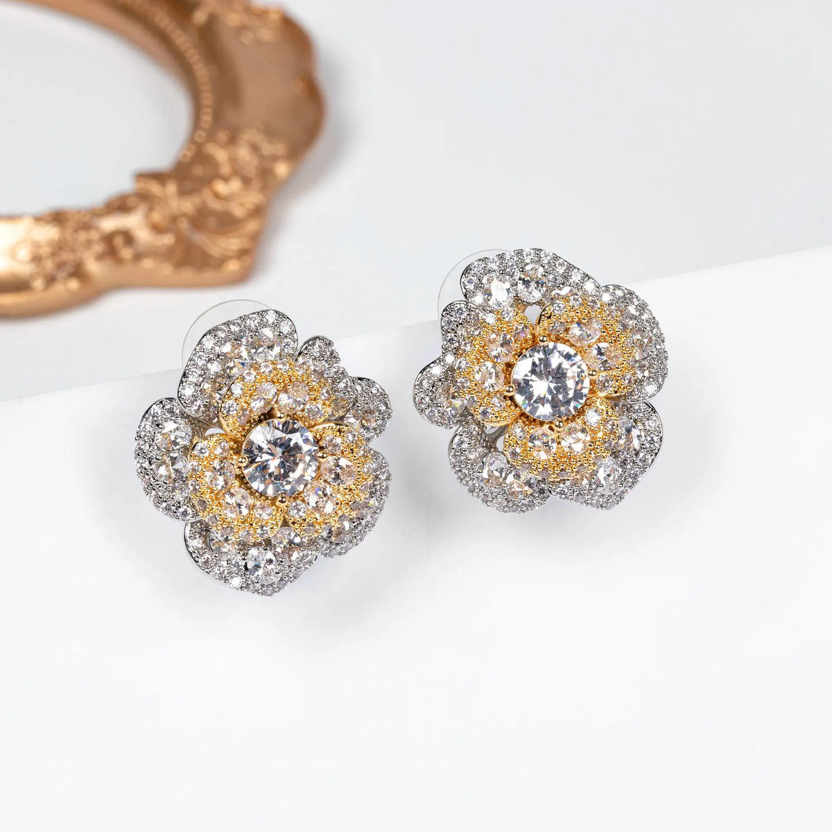 Boucles d'oreilles clous fleur en cristal rouge orangé de luxe