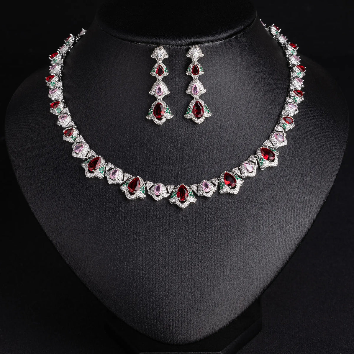 Parure de bijoux glamour en cristal rouge, rose et vert pour soirée de gala