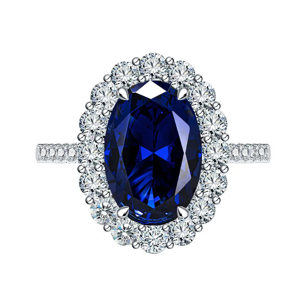 Bague de Fiançailles Ovale de Luxe Saphir Bleu Sertie d'un Halo