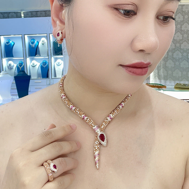 Designer Rose Gold Snake Chain Jewelry Set with Ruby Drop Stones