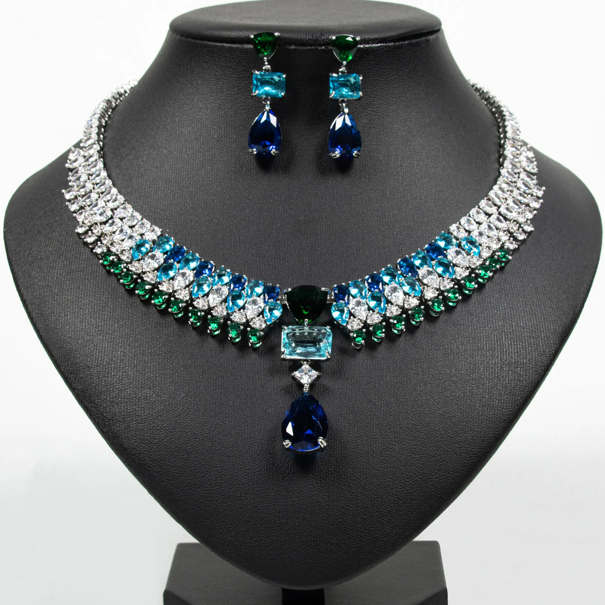 Parure de bijoux élégante avec pendentif en cristal bleu-vert en forme de larme