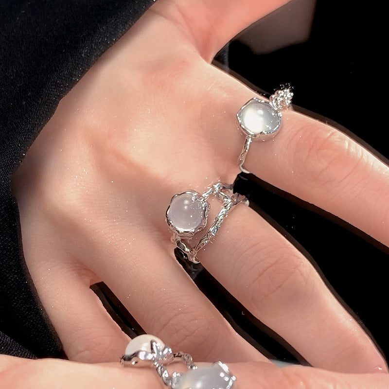 Silver niche moonstone ring