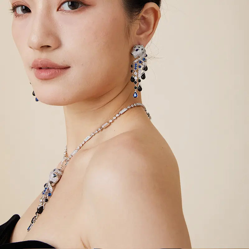 Boucles d'oreilles léopard personnalisées, plaquées or, aux yeux bleus et frangées