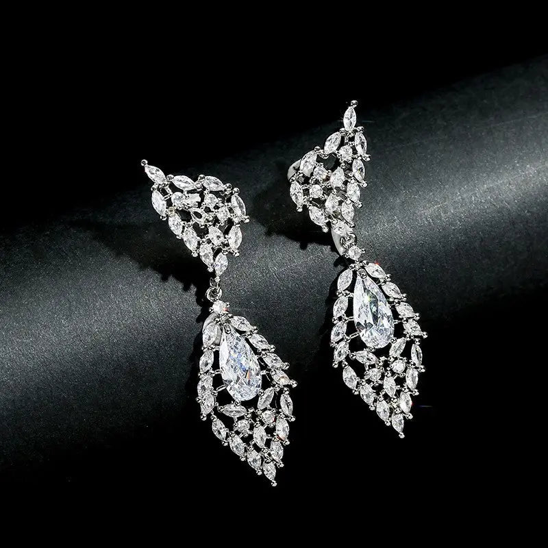 Parure boucles d'oreilles et collier ailes en zircon de luxe