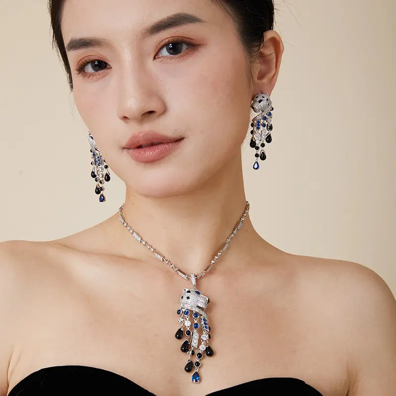 Boucles d'oreilles léopard personnalisées, plaquées or, aux yeux bleus et frangées