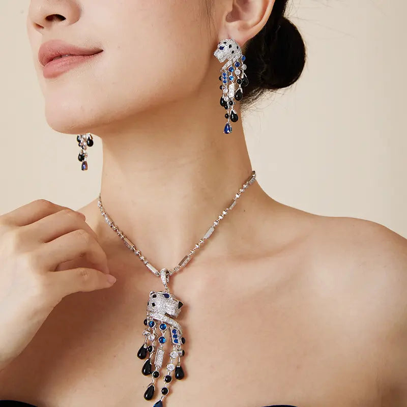 Boucles d'oreilles léopard personnalisées, plaquées or, aux yeux bleus et frangées