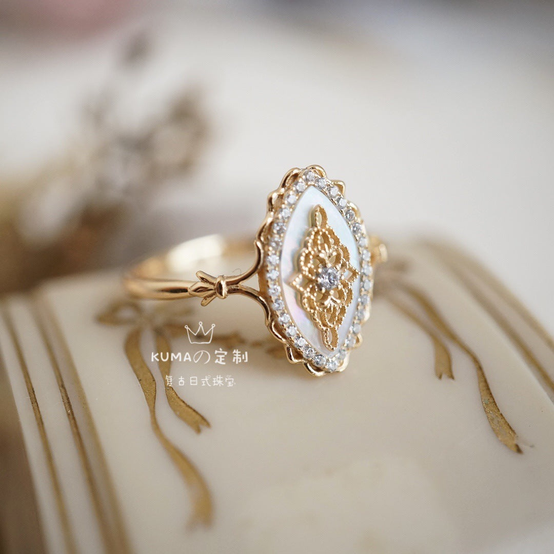 White shell hollow lace ring