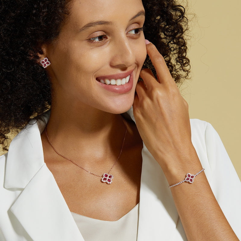 Fashion diamond studded four leaf flower bracelet