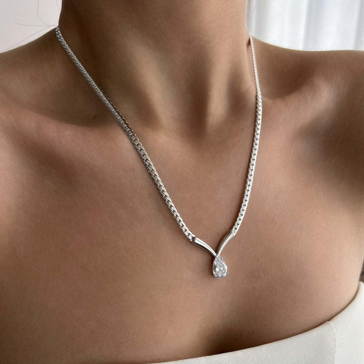 Water drop zircon snake bone necklace