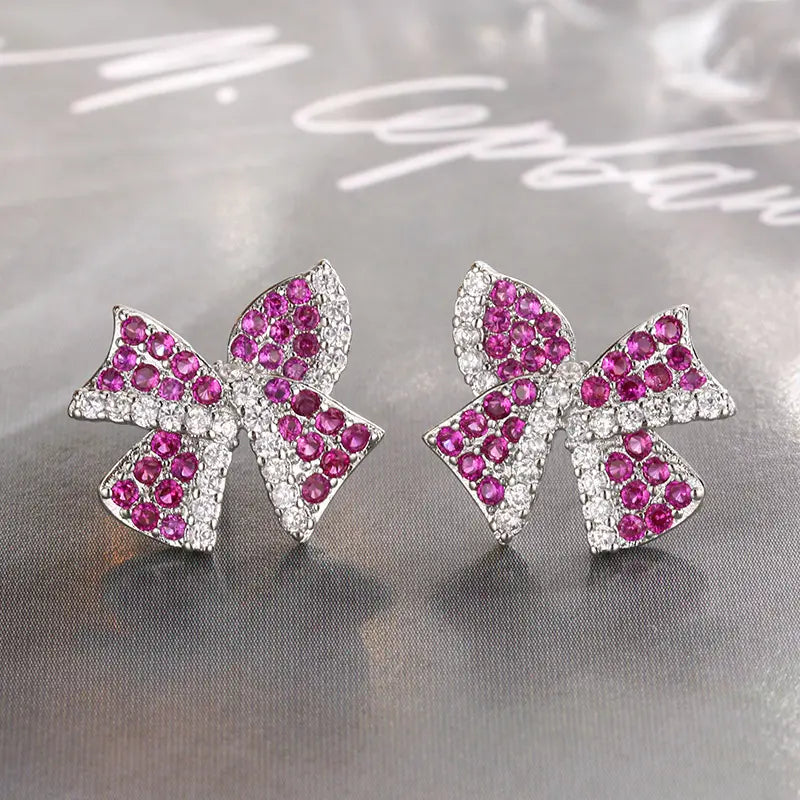 Parure de bijoux en zirconium avec des fleurs roses de luxe léger