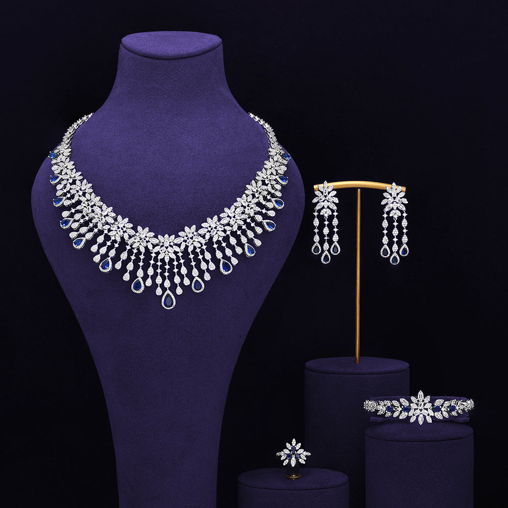 Parure de bijoux de mariée à pompon émeraude – Collection de luxe d'exception