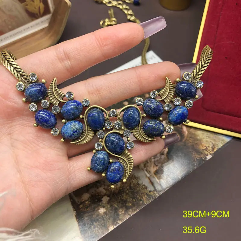 Ensemble collier et boucles d'oreilles turquoise au design vintage