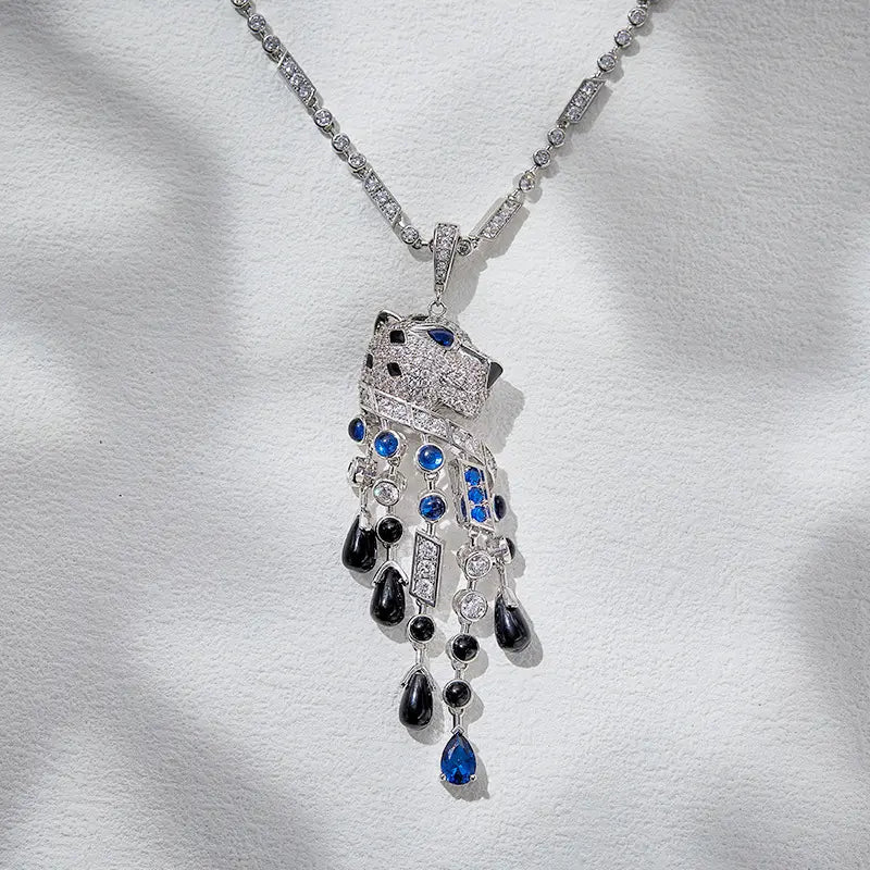 Boucles d'oreilles léopard personnalisées, plaquées or, aux yeux bleus et frangées