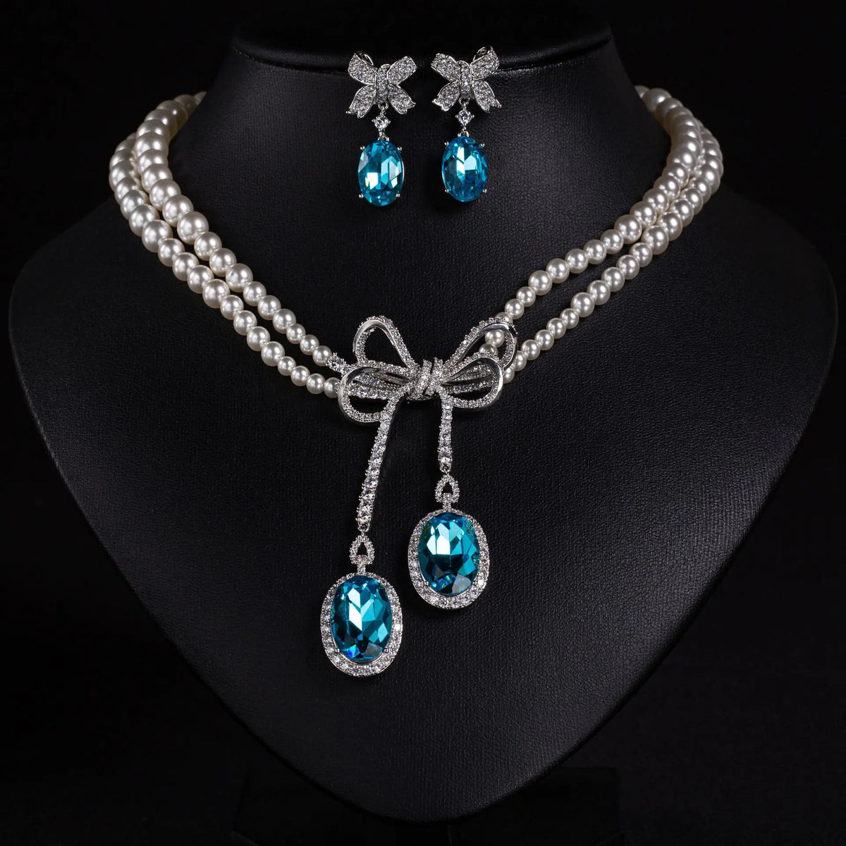 Ensemble collier et boucles d'oreilles nœud papillon en perles et diamants, style léger et luxueux