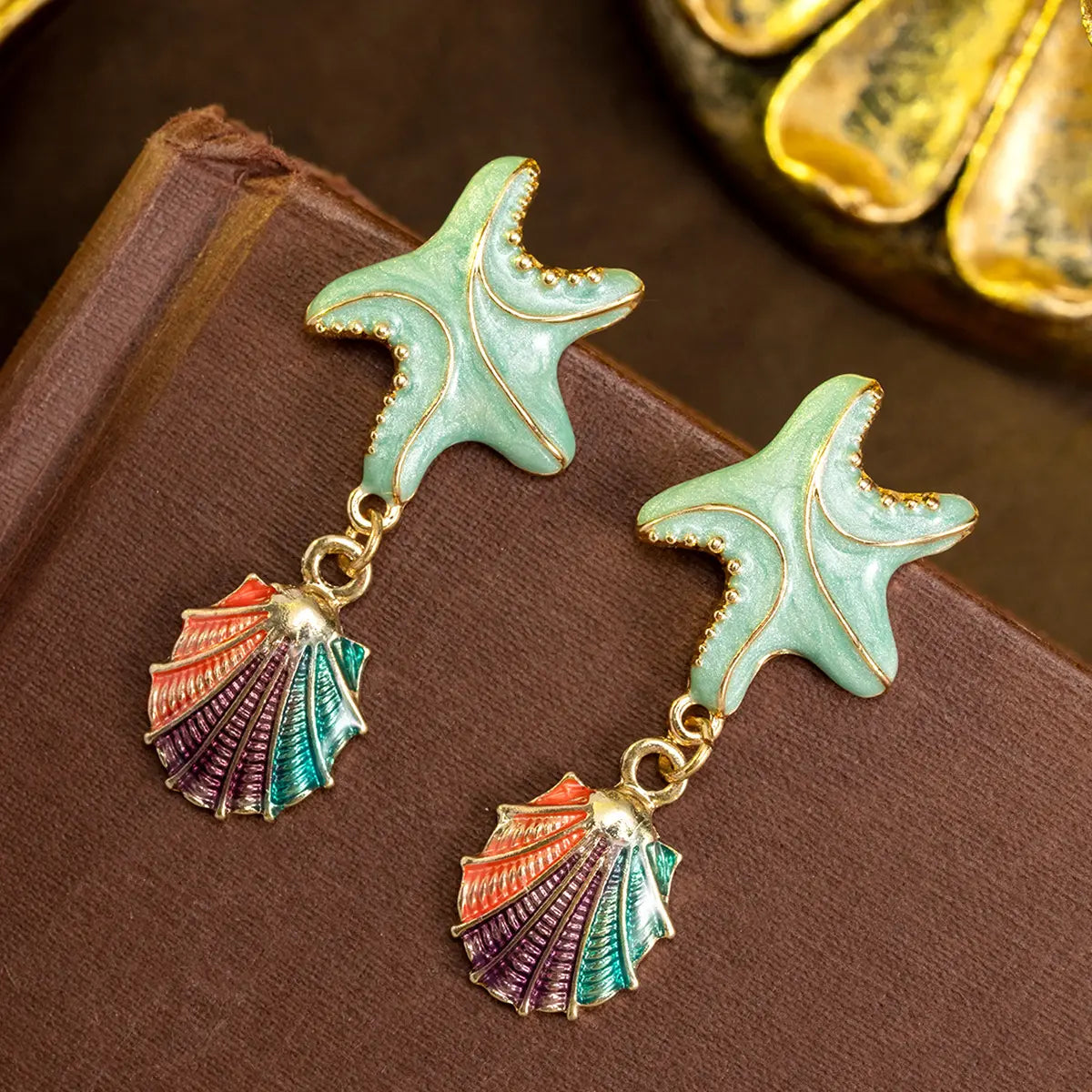 Boucles d'oreilles pendantes Étoiles de mer et Coquillages d'inspiration marine pour Femme