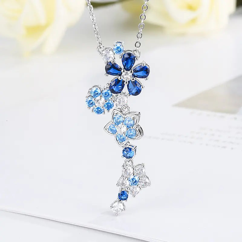 Parure de bijoux en forme de fleur de zircon bleu à la mode, collier, boucles d'oreilles et bracelet