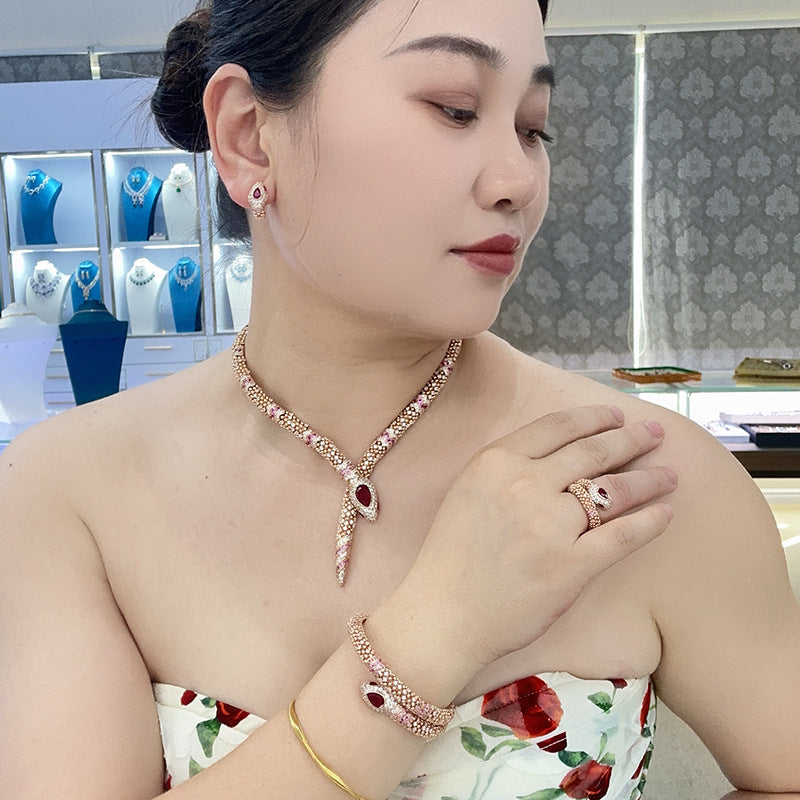Designer Rose Gold Snake Chain Jewelry Set with Ruby Drop Stones