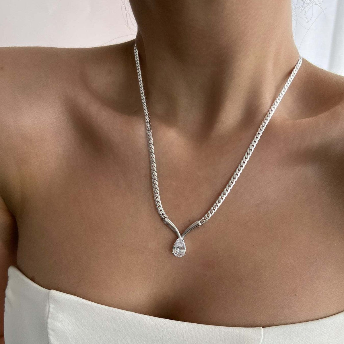 Water drop zircon snake bone necklace