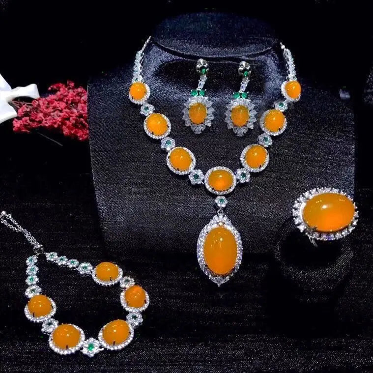 Parure de bijoux quatre pièces en diamant et pierres précieuses de mode