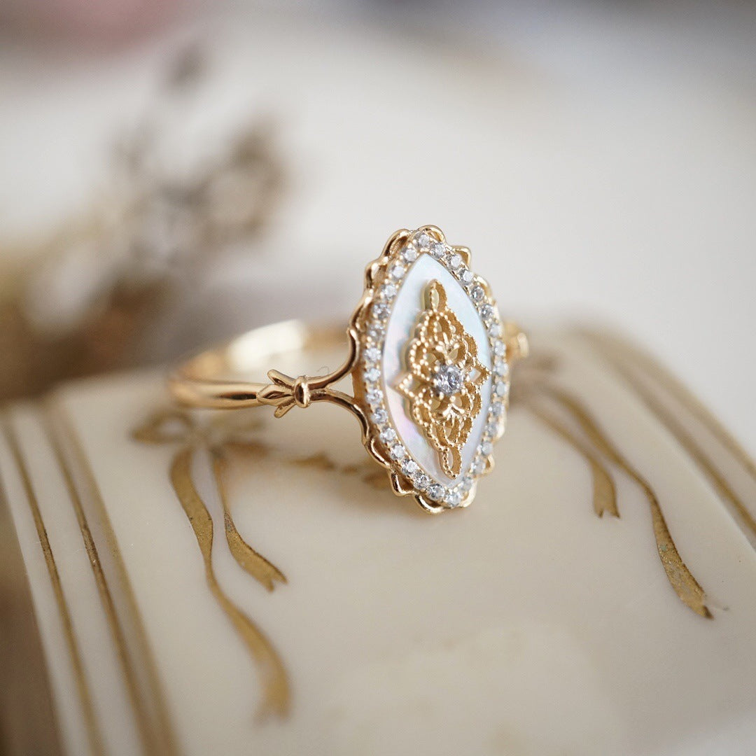 White shell hollow lace ring