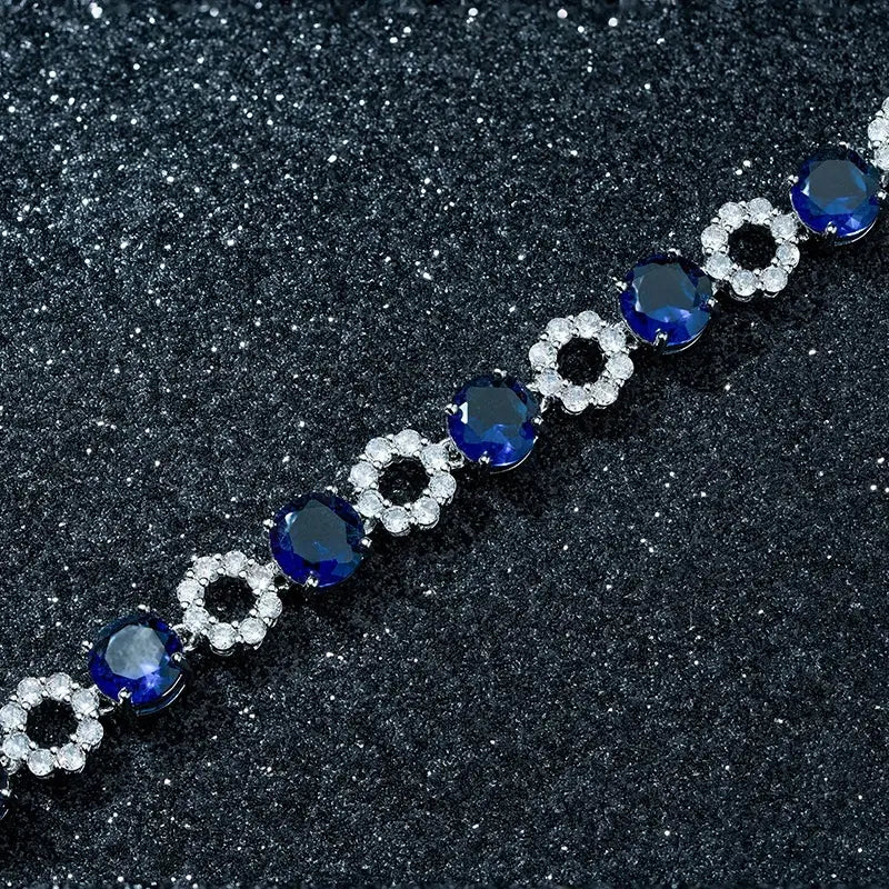 Parure de bijoux en zirconium avec des fleurs roses de luxe léger