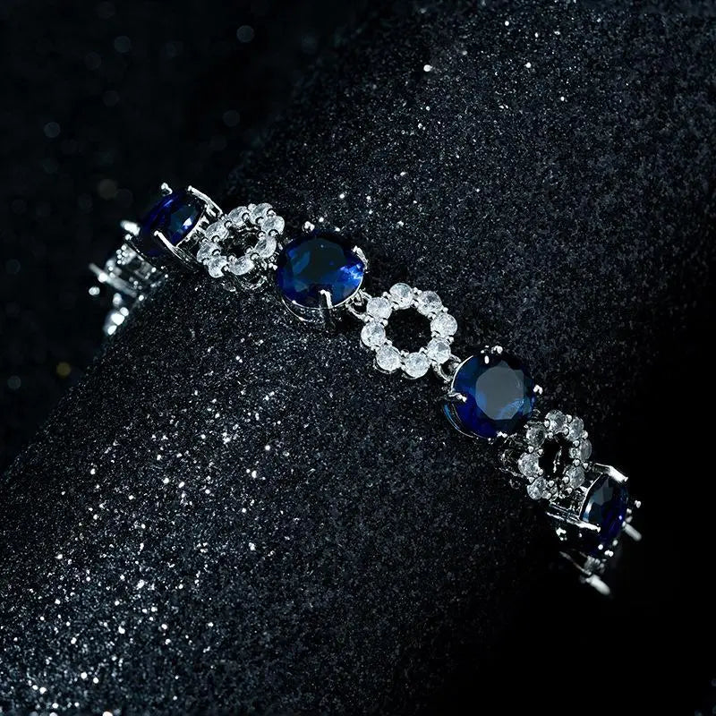 Parure de bijoux en zirconium avec des fleurs roses de luxe léger