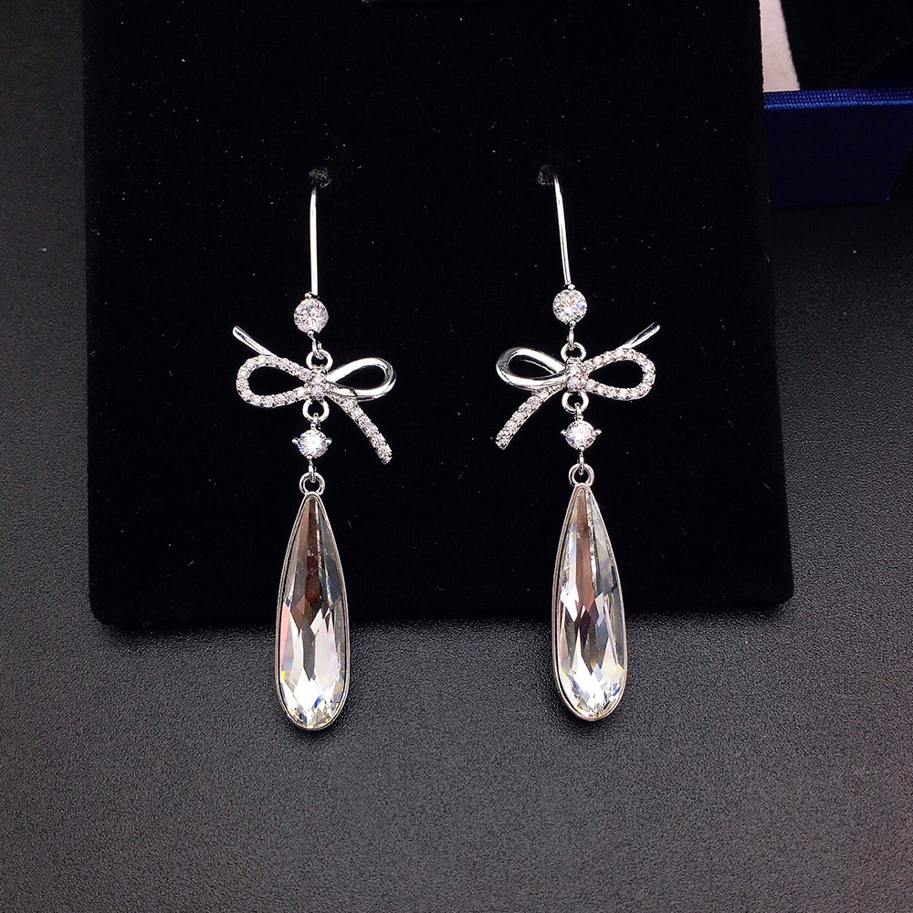 Boucles d'oreilles pendantes de luxe en cristal bleu en forme de nœud pour femme