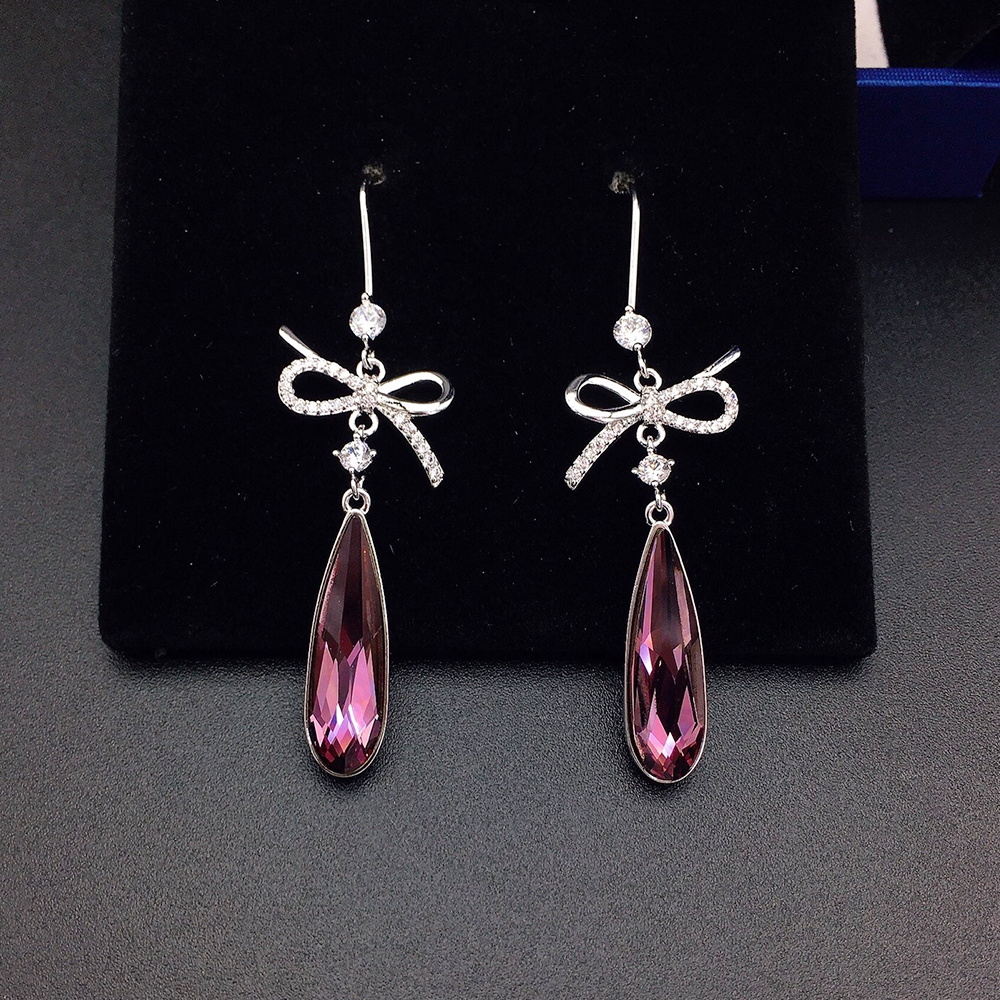 Boucles d'oreilles pendantes de luxe en cristal bleu en forme de nœud pour femme