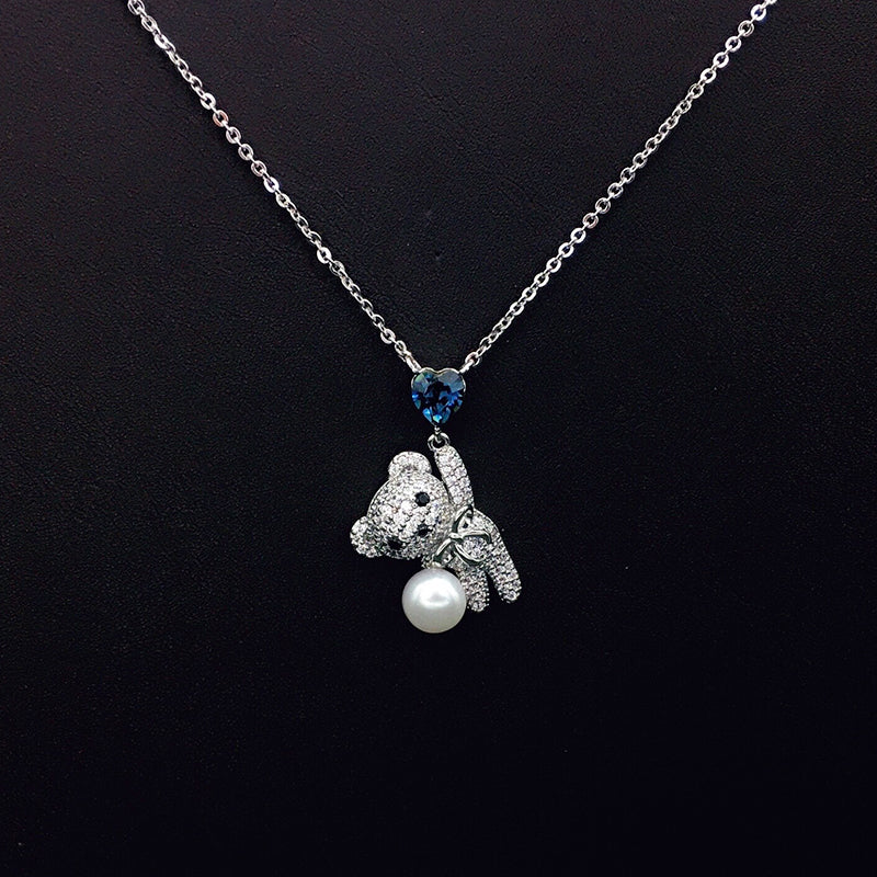 Sparkling Teddy Bear Necklace with Blue Heart Crystal & Pearl for Romantic Dates
