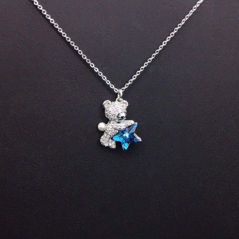 Sweet Gold Teddy Bear Necklace with Blue Star Crystal & Pearl – A Thoughtful Gift Idea