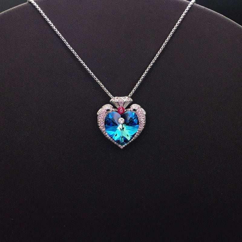 Elegant Silver Heart - shaped Necklace with Blue Crystal for Formal Events