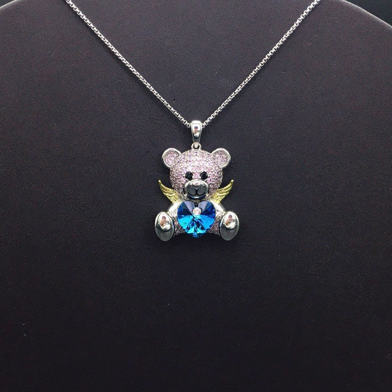 Enchanting Silver Teddy Bear Necklace with Pink Crystals, Golden Wings and Blue Heart for Fairy - tale Events