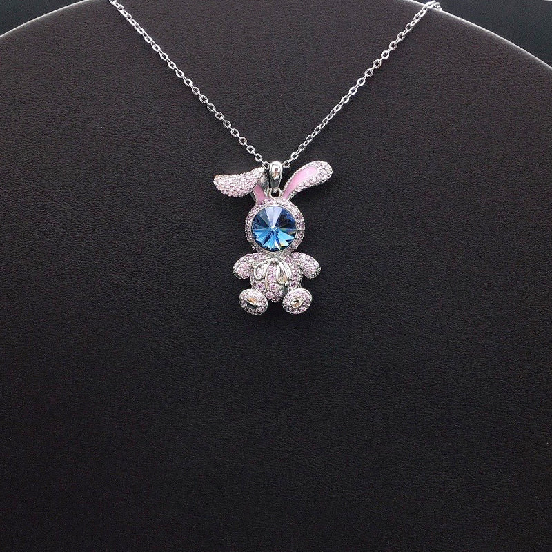 Elegant Silver Bunny Pendant with Pink Accents and Blue Crystal Face for Casual Playful Style
