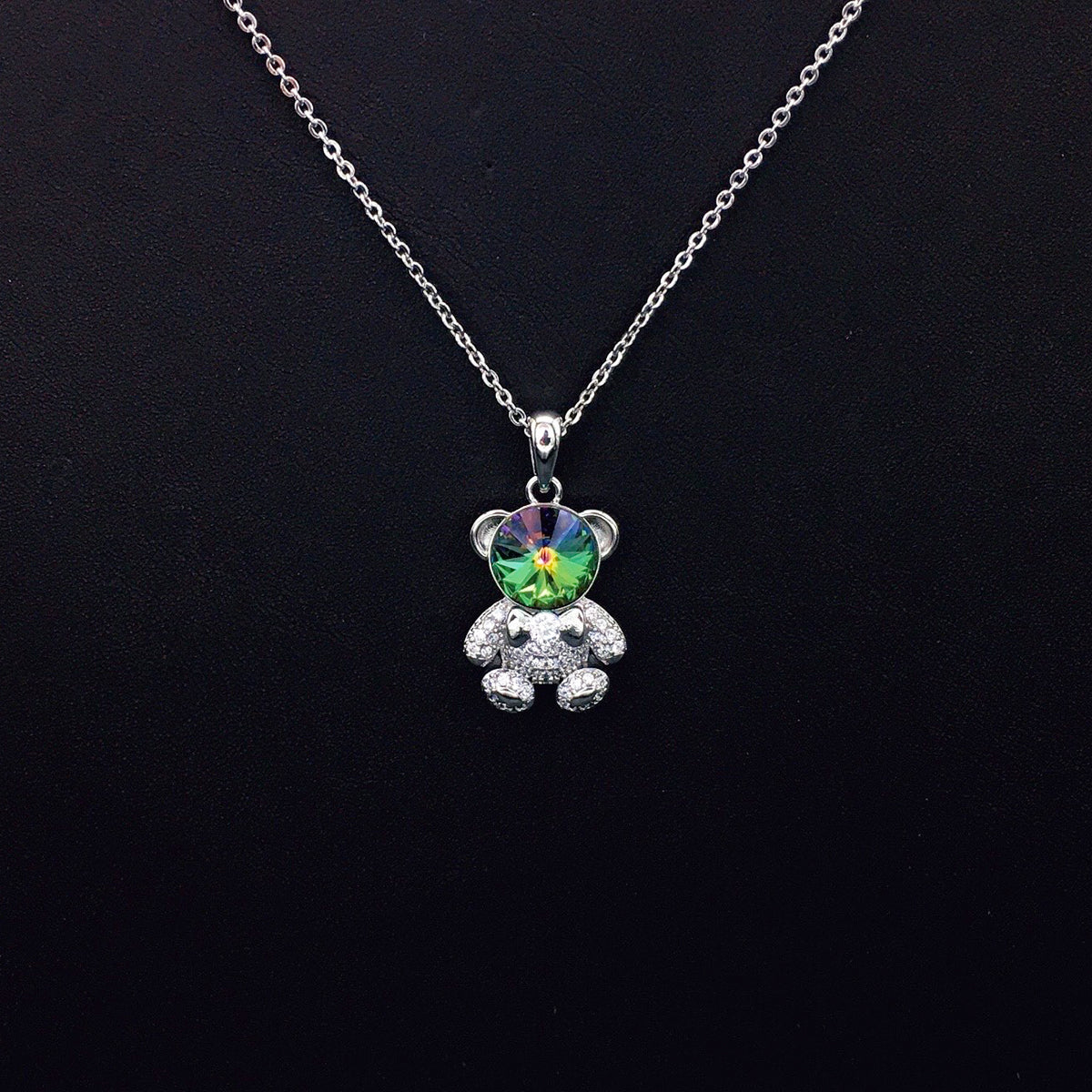 Delicate Gold Teddy Bear Necklace with Sparkling Blue Crystal as a Sweet Gift