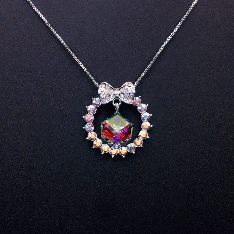 Elegant Bow - Accented Blue Crystal Wreath Necklace for Special Occasions